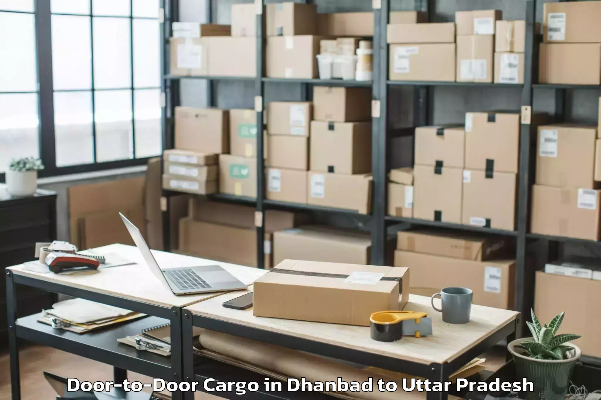 Top Dhanbad to Nehru Gram Bharati Vishwavidya Door To Door Cargo Available